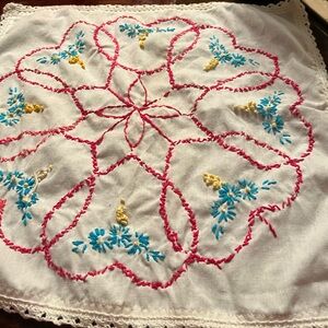 Hand-Embroidered White Floral Table Linen with Pink, Blue & Yellow Accents